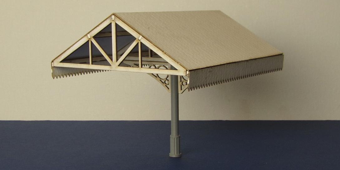 B 70-09M O gauge canopy - middle section Middle section of canopy. Composed of mostly laser cut elements with 3D printed column. End sections also available.
